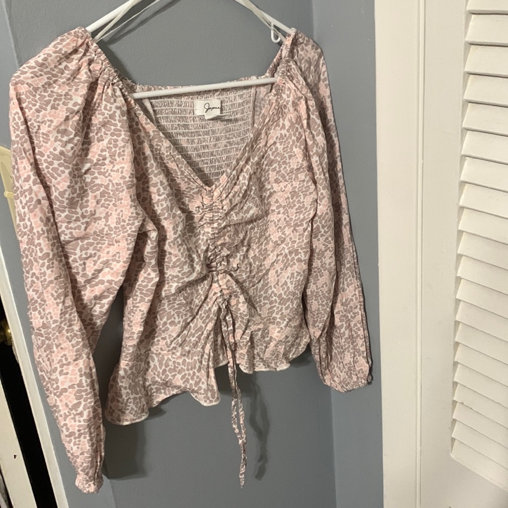 Cropped top. New without tags. Never worn.